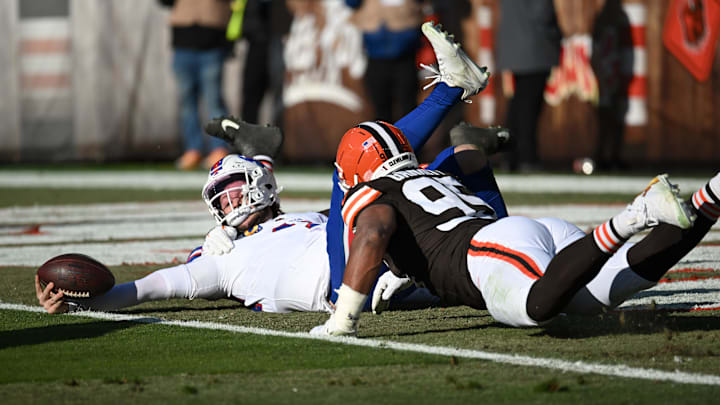 Dec 21, 2025; Cleveland, Ohio, USA; Buffalo Bills quarterback Josh Allen (17) is sacked by Cleveland Browns defensive tackle Mason Graham (94) and defensive end Myles Garrett (95) during the first half at Huntington Bank Field. Both Cleveland players were credited with a half of sack on the play. Dec 21, 2025; Cleveland, Ohio, USA; Buffalo Bills quarterback Josh Allen (17) is sacked by Cleveland Browns defensive tackle Mason Graham (94) and defensive end Myles Garrett (95) during the first half at Huntington Bank Field. Both Cleveland players were credited with a half of sack on the play.