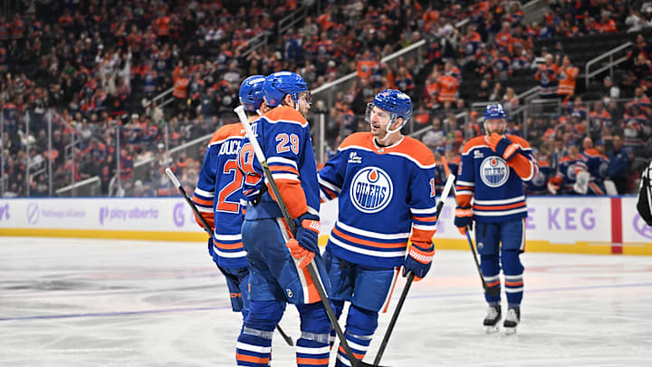 Nov 25, 2025; Edmonton, Alberta, CAN;  Edmonton Oilers centre Leon Draisaitl (29) and Oilers left winger Zach Hyman (18) celebrate a goal on the Dallas Stars during the third period at Rogers Place. Mandatory Credit: Walter Tychnowicz-Imagn Images