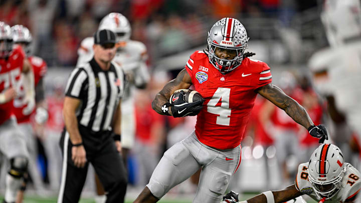 Dec 31, 2025; Arlington, TX, USA; Ohio State Buckeyes wide receiver Jeremiah Smith (4) runs for a touchdown during the 2025 Cotton Bowl and quarterfinal game of the College Football Playoff at AT&T Stadium. Mandatory Credit: Jerome Miron-Imagn Images