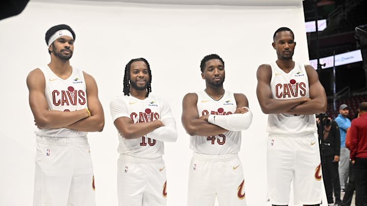 Sep 29, 2025; Cleveland, OH, USA; Cleveland Cavaliers center Jarrett Allen (31) and guard Darius Garland (10) and guard Donovan Mitchell (45) and forward Evan Mobley (4) poses for a photo during media day at Rocket Arena. Mandatory Credit: Ken Blaze-Imagn Images Sep 29, 2025; Cleveland, OH, USA; Cleveland Cavaliers center Jarrett Allen (31) and guard Darius Garland (10) and guard Donovan Mitchell (45) and forward Evan Mobley (4) poses for a photo during media day at Rocket Arena. Mandatory Credit: Ken Blaze-Imagn Images