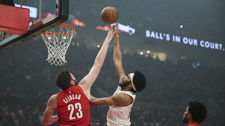 Feb 1, 2026; Portland, Oregon, USA; Cleveland Cavaliers center Jarrett Allen (31) puts up a shot during the first half against Portland Trail Blazers center Donovan Clingan (23) at Moda Center. Mandatory Credit: Troy Wayrynen-Imagn Images