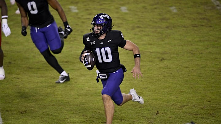 Nov 29, 2025; Fort Worth, Texas, USA; TCU Horned Frogs quarterback Josh Hoover (10) runs with the ball during the second half against the Cincinnati Bearcats at Amon G. Carter Stadium. Mandatory Credit: Jerome Miron-Imagn Images