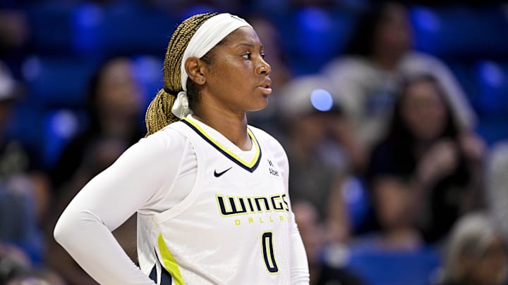 Aug 27, 2025; Arlington, Texas, USA; Dallas Wings forward Amy Okonkwo (0) looks on during the first half against the Connecticut Sun at College Park Center. Mandatory Credit: Jerome Miron-Imagn Images