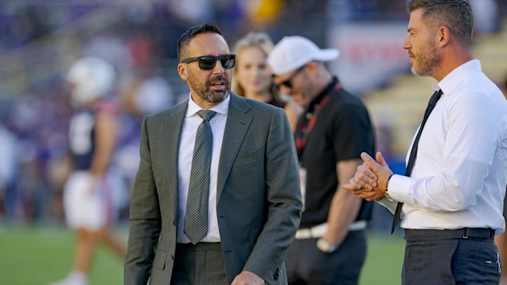 Oct 14, 2023; Baton Rouge, Louisiana, USA;  Sportscaster Joe Tessitore, left, talks with sportscaster Jesse Palmer before a game between the LSU Tigers and the Auburn Tigers at Tiger Stadium. Mandatory Credit: Matthew Hinton-Imagn Images