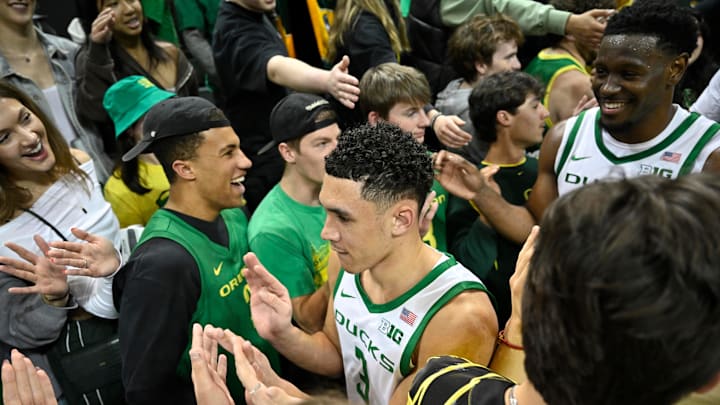 Mar 4, 2025; Eugene, Oregon, USA; Oregon Ducks guard Jackson Shelstad (3) is congratulated by fans after a 73-64 win against the Indiana Hoosiers at Matthew Knight Arena. Mandatory Credit: Craig Strobeck-Imagn Images