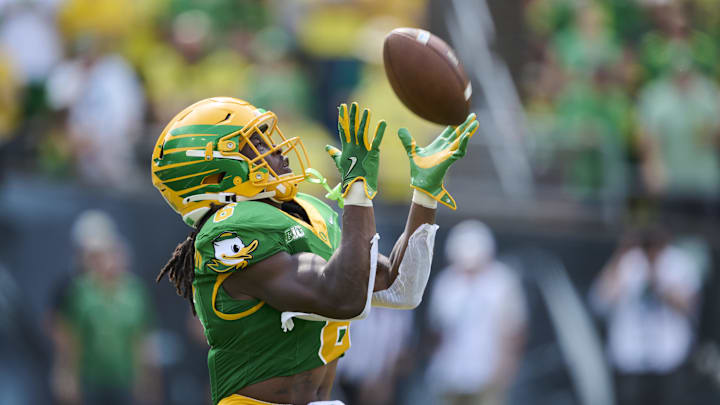 Aug 30, 2025; Eugene, Oregon, USA; Oregon Ducks running back Noah Whittington (6) catches the opening game kickoff during the first half against the Montana State Bobcats at Autzen Stadium. Mandatory Credit: Troy Wayrynen-Imagn Images