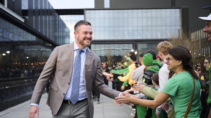 Nov 14, 2025; Eugene, Oregon, USA; Oregon Ducks head coach Dan Lanning high fives fans before a game between the Oregon Ducks and the Minnesota Golden Gophers at Autzen Stadium. Mandatory Credit: Troy Wayrynen-Imagn Images