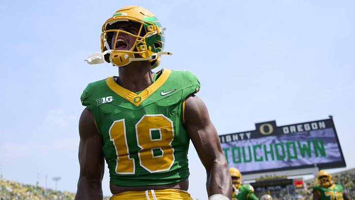 Aug 30, 2025; Eugene, Oregon, USA; Oregon Ducks tight end Kenyon Sadiq (18) celebrates after scoring a touchdown during the first half against the Montana State Bobcats at Autzen Stadium. Mandatory Credit: Troy Wayrynen-Imagn Images