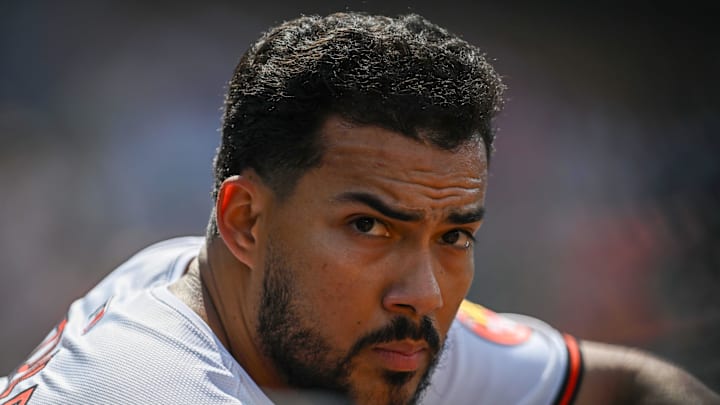 Baltimore Orioles outfielder Anthony Santander (25) looks on from the dugout during the first inning against the Toronto Blue Jays at Oriole Park at Camden Yards in 2024.