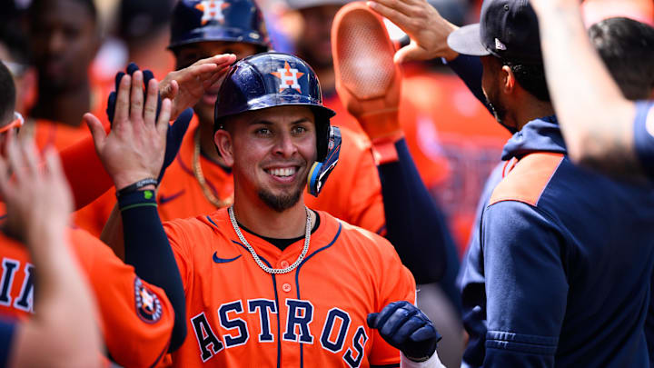 Sep 28, 2025; Anaheim, California, USA; Houston Astros third baseman Ramon Urias (29) is greeted by teammates after hitting a home run during the fifth inning against the Los Angeles Angels at Angel Stadium. Mandatory Credit: William Liang-Imagn Images