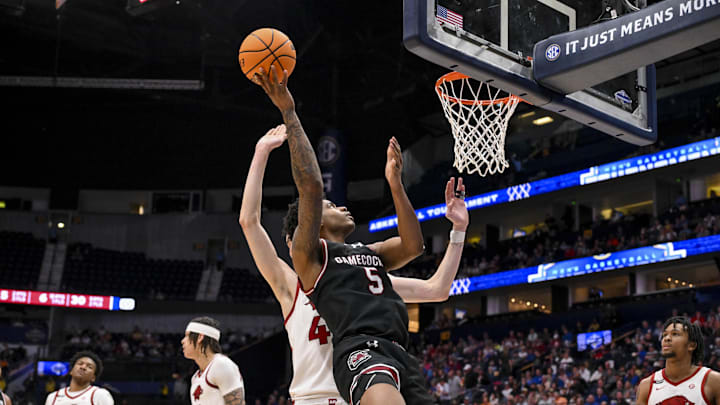 Mar 12, 2025; Nashville, TN, USA; South Carolina Gamecocks forward Nick Pringle (5) lays the ball in against the Arkansas Razorbacks during the second half at Bridgestone Arena. Mandatory Credit: Steve Roberts-Imagn Images Mar 12, 2025; Nashville, TN, USA; South Carolina Gamecocks forward Nick Pringle (5) lays the ball in against the Arkansas Razorbacks during the second half at Bridgestone Arena. Mandatory Credit: Steve Roberts-Imagn Images