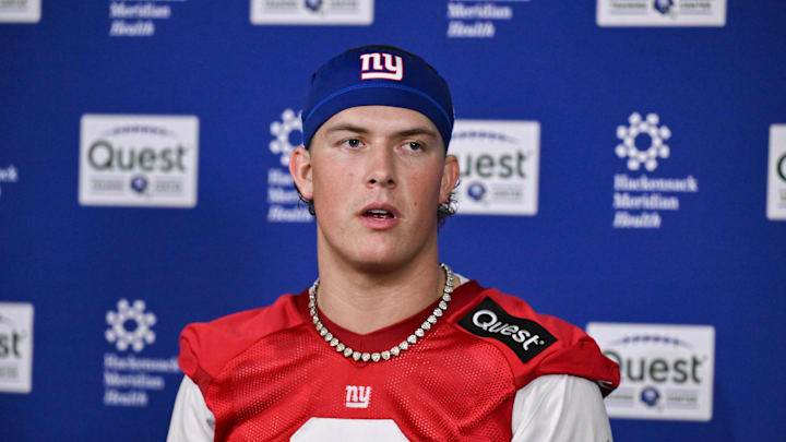 May 9, 2025; East Rutherford, NJ, USA; New York Giants quarterback Jaxson Dart (6) speaks to members of the press after rookie minicamp at Quest Diagnostics Training Center. Mandatory Credit: John Jones-Imagn Images