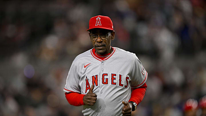 Apr 15, 2025; Arlington, Texas, USA; Los Angeles Angels manager Ron Washington trots back to the dugout during the eighth inning against the Texas Rangers at Globe Life Field. All MLB players will be wearing the number 42 on Jackie Robinson Day to commemorate Robinson making his major league debut in 1947. Mandatory Credit: Jerome Miron-Imagn Images Apr 15, 2025; Arlington, Texas, USA; Los Angeles Angels manager Ron Washington trots back to the dugout during the eighth inning against the Texas Rangers at Globe Life Field. All MLB players will be wearing the number 42 on Jackie Robinson Day to commemorate Robinson making his major league debut in 1947. Mandatory Credit: Jerome Miron-Imagn Images