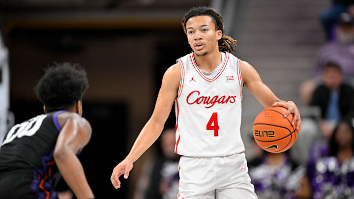 Jan 28, 2026; Fort Worth, Texas, USA; Houston Cougars guard Kingston Flemings (4) brings the ball up court against the TCU Horned Frogs during the second half at Ed and Rae Schollmaier Arena. Mandatory Credit: Jerome Miron-Imagn Images