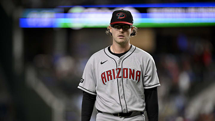 Aug 11, 2025; Arlington, Texas, USA; Arizona Diamondbacks relief pitcher Andrew Saalfrank (27) comes off the field after he pitches against the Texas Rangers during the ninth inning at Globe Life Field. Mandatory Credit: Jerome Miron-Imagn Images Aug 11, 2025; Arlington, Texas, USA; Arizona Diamondbacks relief pitcher Andrew Saalfrank (27) comes off the field after he pitches against the Texas Rangers during the ninth inning at Globe Life Field. Mandatory Credit: Jerome Miron-Imagn Images