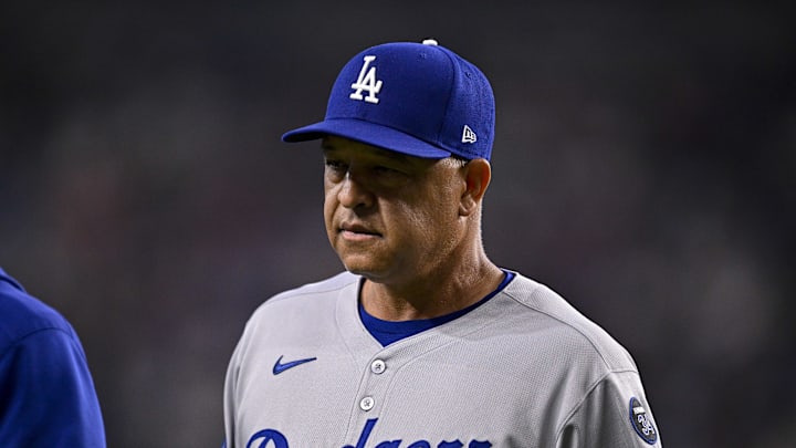 Apr 20, 2025; Arlington, Texas, USA; Los Angeles Dodgers manager Dave Roberts (30) comes off the field during the game between the Texas Rangers and the Los Angeles Dodgers at Globe Life Field. Mandatory Credit: Jerome Miron-Imagn Images Apr 20, 2025; Arlington, Texas, USA; Los Angeles Dodgers manager Dave Roberts (30) comes off the field during the game between the Texas Rangers and the Los Angeles Dodgers at Globe Life Field. Mandatory Credit: Jerome Miron-Imagn Images
