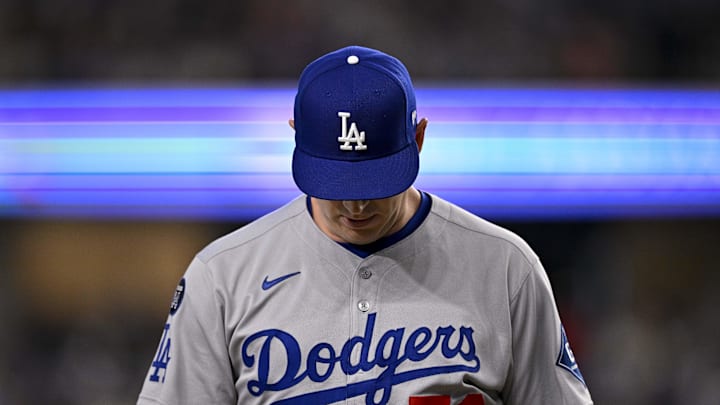 Apr 20, 2025; Arlington, Texas, USA; Los Angeles Dodgers relief pitcher Evan Phillips (59) comes off the field during the game between the Texas Rangers and the Los Angeles Dodgers at Globe Life Field. Mandatory Credit: Jerome Miron-Imagn Images