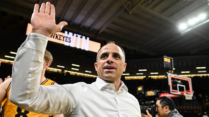 Feb 25, 2026; Iowa City, Iowa, USA; Iowa Hawkeyes head coach Ben McCollum reacts with fans after the game against the Ohio State Buckeyes at Carver-Hawkeye Arena. Mandatory Credit: Jeffrey Becker-Imagn Images Feb 25, 2026; Iowa City, Iowa, USA; Iowa Hawkeyes head coach Ben McCollum reacts with fans after the game against the Ohio State Buckeyes at Carver-Hawkeye Arena. Mandatory Credit: Jeffrey Becker-Imagn Images