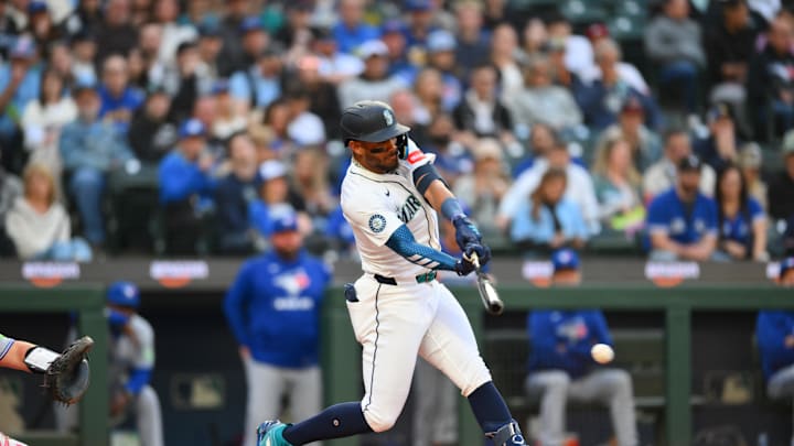 Seattle Mariners center fielder Julio Rodriguez (44) hits a single against the Toronto Blue Jays during the fourth inning at T-Mobile Park on May 10.