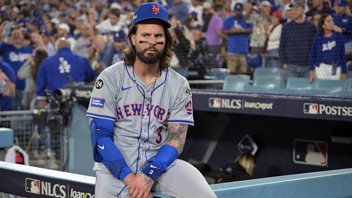 Oct 20, 2024; Los Angeles, California, USA; New York Mets outfielder Jesse Winker (3) reacts after the loss against the Los Angeles Dodgers in game six of the NLCS for the 2024 MLB playoffs to advance to the World Series at Dodger Stadium. Mandatory Credit: Jayne Kamin-Oncea-Imagn Images