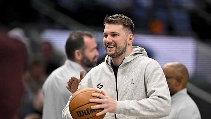 Jan 22, 2025; Dallas, Texas, USA; Dallas Mavericks guard Luka Doncic (77) looks on during a stoppage in play during the first half of the game between the Dallas Mavericks and the Minnesota Timberwolves at the American Airlines Center. Mandatory Credit: Jerome Miron-Imagn Images