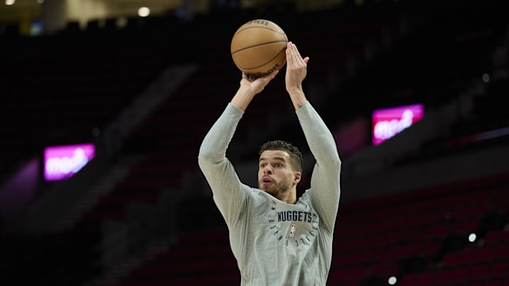 Mar 21, 2025; Portland, Oregon, USA; Denver Nuggets forward Michael Porter Jr. (1) warms up before a game against the Portland Trail Blazers at Moda Center. Mandatory Credit: Troy Wayrynen-Imagn Images Mar 21, 2025; Portland, Oregon, USA; Denver Nuggets forward Michael Porter Jr. (1) warms up before a game against the Portland Trail Blazers at Moda Center. Mandatory Credit: Troy Wayrynen-Imagn Images