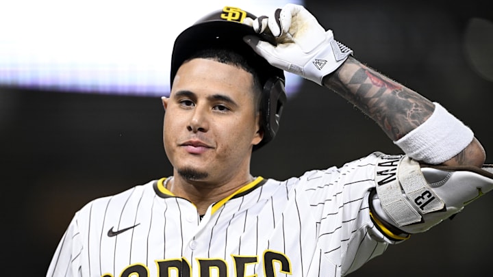 Sep 22, 2025; San Diego, California, USA; San Diego Padres third baseman Manny Machado (13) takes off his helmet after hitting a fly ball during the fifth inning against the Milwaukee Brewers at Petco Park. Mandatory Credit: Denis Poroy-Imagn Images Sep 22, 2025; San Diego, California, USA; San Diego Padres third baseman Manny Machado (13) takes off his helmet after hitting a fly ball during the fifth inning against the Milwaukee Brewers at Petco Park. Mandatory Credit: Denis Poroy-Imagn Images