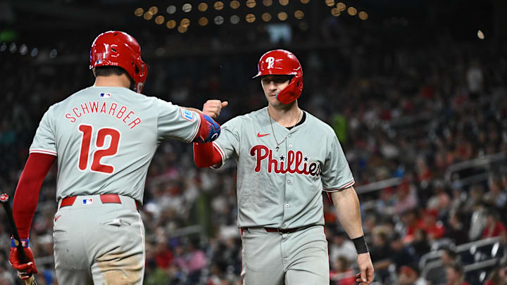 Sep 27, 2024; Washington, District of Columbia, USA; Philadelphia Phillies outfielder Austin Hays (9) celebrates with designated hitter Kyle Schwarber (12) after hitting a home run against the Washington Nationals during the eighth inning at Nationals Park. Sep 27, 2024; Washington, District of Columbia, USA; Philadelphia Phillies outfielder Austin Hays (9) celebrates with designated hitter Kyle Schwarber (12) after hitting a home run against the Washington Nationals during the eighth inning at Nationals Park.