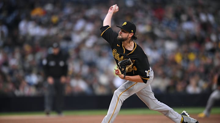 May 28, 2022; San Diego, California, USA; Pittsburgh Pirates starting pitcher J.T. Brubaker (34) throws a pitch against the San Diego Padres during the first inning at Petco Park. Mandatory Credit: Orlando Ramirez-Imagn Images