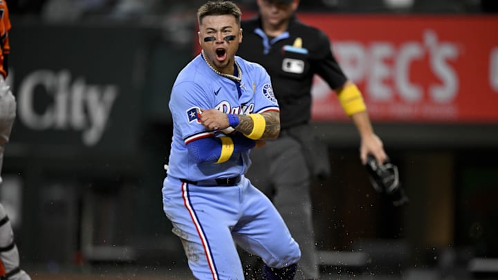 Texas Rangers right fielder Cody Freeman (39) celebrates after he scores from first base during the sixth inning against the Houston Astros at Globe Life Field. Texas Rangers right fielder Cody Freeman (39) celebrates after he scores from first base during the sixth inning against the Houston Astros at Globe Life Field.