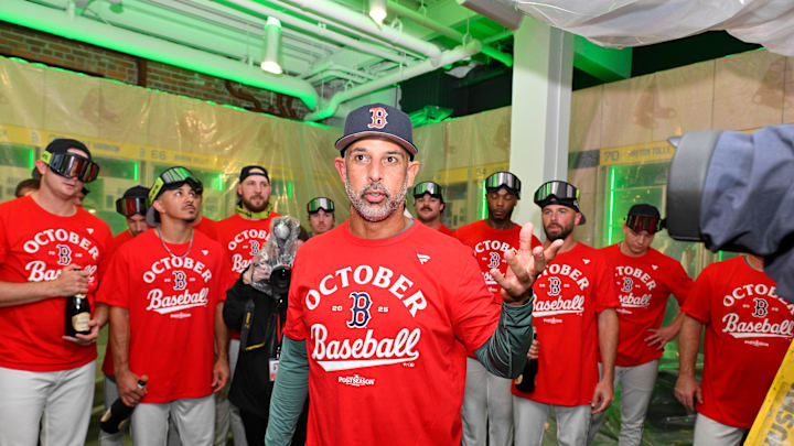 Sep 26, 2025; Boston, Massachusetts, USA; Boston Red Sox manager Alex Cora (13) addresses the team after they clinched a playoff spot after their game against the Detroit Tigers at Fenway Park. Mandatory Credit: Eric Canha-Imagn Images Sep 26, 2025; Boston, Massachusetts, USA; Boston Red Sox manager Alex Cora (13) addresses the team after they clinched a playoff spot after their game against the Detroit Tigers at Fenway Park. Mandatory Credit: Eric Canha-Imagn Images