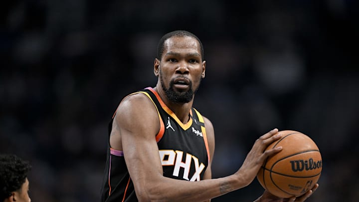 Mar 9, 2025; Dallas, Texas, USA; Phoenix Suns forward Kevin Durant (35) looks to pass the ball against the Dallas Mavericks during the first quarter at the American Airlines Center. Mandatory Credit: Jerome Miron-Imagn Images
