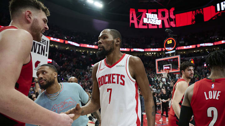 Jan 9, 2026; Portland, Oregon, USA; Houston Rockets forward Kevin Durant (7) congratulates Portland Trail Blazers center Donovan Clingan (23) after a game at Moda Center. Mandatory Credit: Troy Wayrynen-Imagn Images