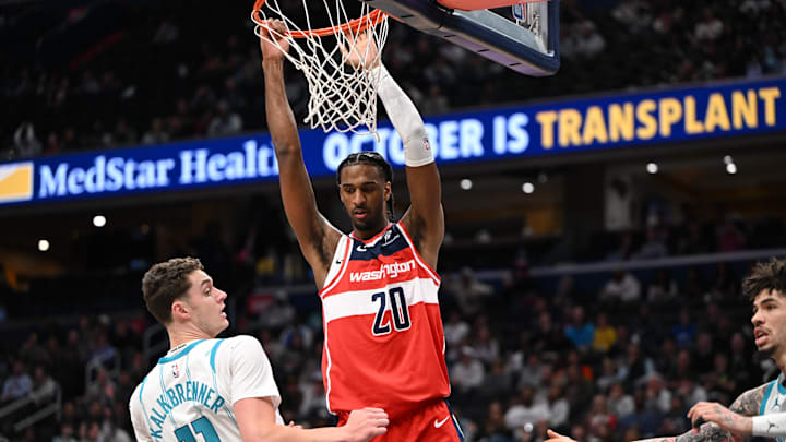 Oct 26, 2025; Washington, District of Columbia, USA; Washington Wizards center Alex Sarr (20) dunks the ball over Charlotte Hornets center Ryan Kalkbrenner (11) during the first quarter at Capital One Arena. Mandatory Credit: Rafael Suanes-Imagn Images Oct 26, 2025; Washington, District of Columbia, USA; Washington Wizards center Alex Sarr (20) dunks the ball over Charlotte Hornets center Ryan Kalkbrenner (11) during the first quarter at Capital One Arena. Mandatory Credit: Rafael Suanes-Imagn Images