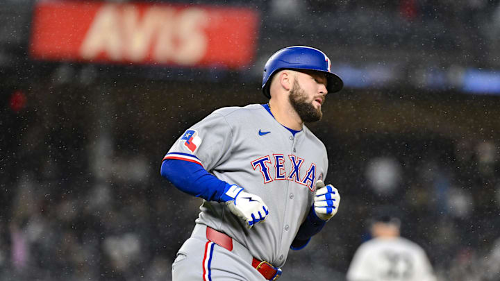 Texas Rangers first baseman Jake Burger (21) runs the bases after hitting a solo home run against the New York Yankees during the fifth inning at Yankee Stadium on May 21.