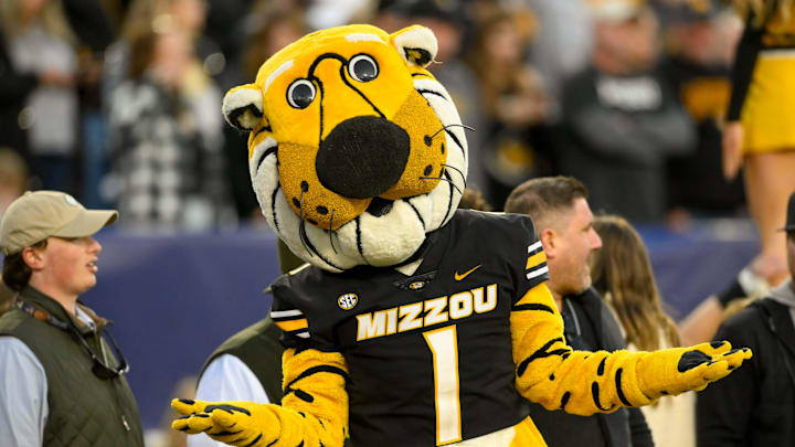 Dec 30, 2024; Nashville, TN, USA;  Missouri Tigers mascot Truman dances of the sideline against the Iowa Hawkeyes during the second half at Nissan Stadium. Mandatory Credit: Steve Roberts-Imagn Images