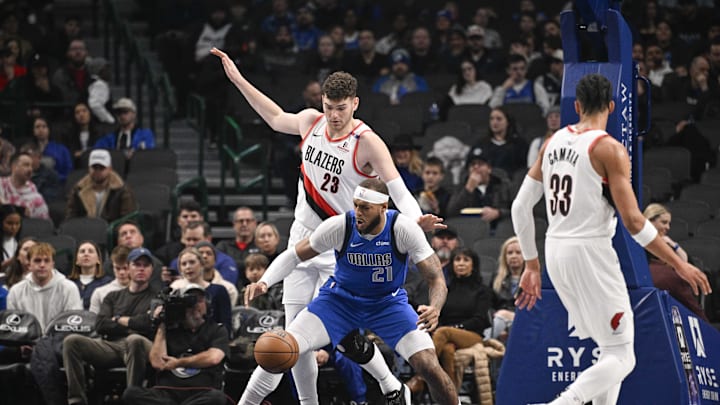 Jan 9, 2025; Dallas, Texas, USA; Portland Trail Blazers center Donovan Clingan (23) and Dallas Mavericks center Daniel Gafford (21) battle for the loose ball during the first quarter at the American Airlines Center. Mandatory Credit: Jerome Miron-Imagn Images Jan 9, 2025; Dallas, Texas, USA; Portland Trail Blazers center Donovan Clingan (23) and Dallas Mavericks center Daniel Gafford (21) battle for the loose ball during the first quarter at the American Airlines Center. Mandatory Credit: Jerome Miron-Imagn Images