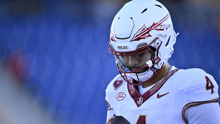 Sep 28, 2024; Dallas, Texas, USA; Florida State Seminoles quarterback DJ Uiagalelei (4) before the game between the Southern Methodist Mustangs and the Florida State Seminoles at Gerald J. Ford Stadium. Mandatory Credit: Jerome Miron-Imagn Images Sep 28, 2024; Dallas, Texas, USA; Florida State Seminoles quarterback DJ Uiagalelei (4) before the game between the Southern Methodist Mustangs and the Florida State Seminoles at Gerald J. Ford Stadium. Mandatory Credit: Jerome Miron-Imagn Images