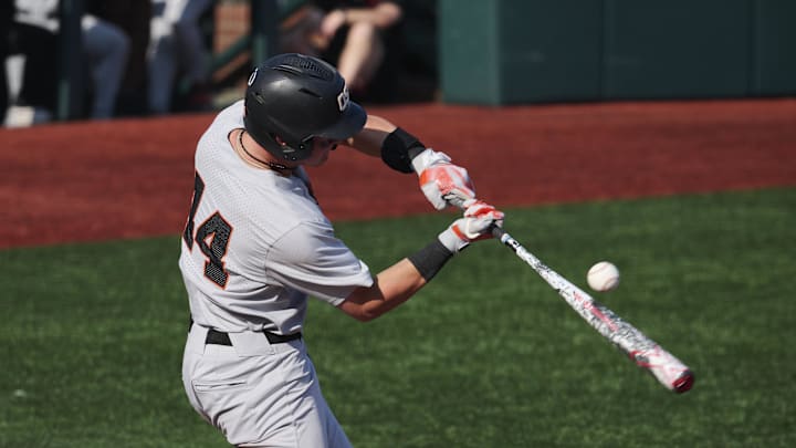 Jun 1, 2025; Corvallis, OR, USA; Oregon St. infielder Trent Caraway (44) hits the ball for a single in the seventh inning against Saint Mary's at the NCAA Corvallis Regional at Goss Stadium. Mandatory Credit: Troy Wayrynen-Imagn Images Jun 1, 2025; Corvallis, OR, USA; Oregon St. infielder Trent Caraway (44) hits the ball for a single in the seventh inning against Saint Mary's at the NCAA Corvallis Regional at Goss Stadium. Mandatory Credit: Troy Wayrynen-Imagn Images