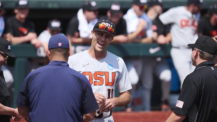 Jun 1, 2025; Corvallis, OR, USA; Oregon St. head coach Mitch Canham talks to referees before a game against Saint Mary's at the NCAA Corvallis Regional at Goss Stadium. Mandatory Credit: Troy Wayrynen-Imagn Images Jun 1, 2025; Corvallis, OR, USA; Oregon St. head coach Mitch Canham talks to referees before a game against Saint Mary's at the NCAA Corvallis Regional at Goss Stadium. Mandatory Credit: Troy Wayrynen-Imagn Images