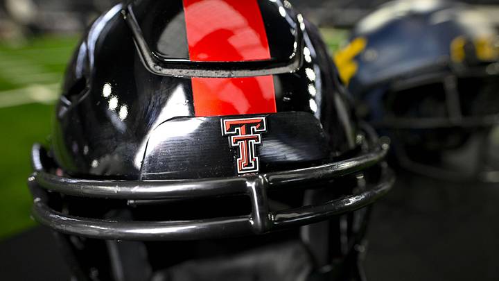 Jul 13, 2023; Arlington, TX, USA; A view of the Texas Tech Red Raiders helmet and logo during the Big 12 football media day at AT&T Stadium. Mandatory Credit: Jerome Miron-Imagn Images Jul 13, 2023; Arlington, TX, USA; A view of the Texas Tech Red Raiders helmet and logo during the Big 12 football media day at AT&T Stadium. Mandatory Credit: Jerome Miron-Imagn Images