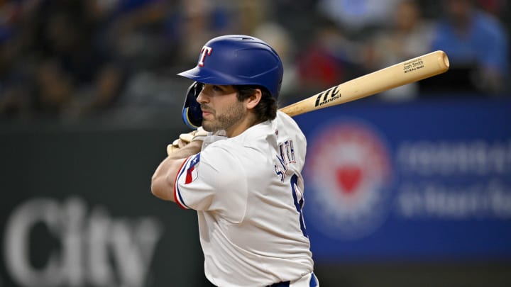 May 2, 2024; Arlington, Texas, USA; Texas Rangers third baseman Josh Smith (8) hits a double against