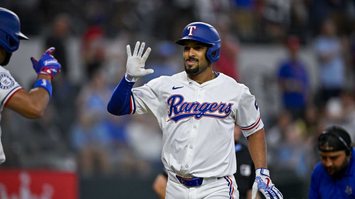 Jul 6, 2024; Arlington, Texas, USA; Texas Rangers second baseman Marcus Semien (2) celebrates during the game between the Texas Rangers and the Tampa Bay Rays at Globe Life Field.