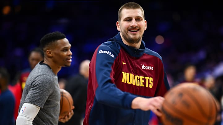 Denver Nuggets center Nikola Jokic warms up with Russell Westbrook before a game. Denver Nuggets center Nikola Jokic warms up with Russell Westbrook before a game.