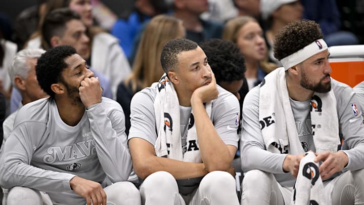 Dallas Mavericks Dinwiddie, Exum and Thompson look on from the bench against the Phoenix Suns at the American Airlines Center. Dallas Mavericks Dinwiddie, Exum and Thompson look on from the bench against the Phoenix Suns at the American Airlines Center.