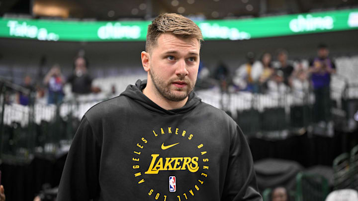 Los Angeles Lakers guard Luka Doncic (77) walks on to the court before the game between the Dallas Mavericks and the Los Angeles Lakers.