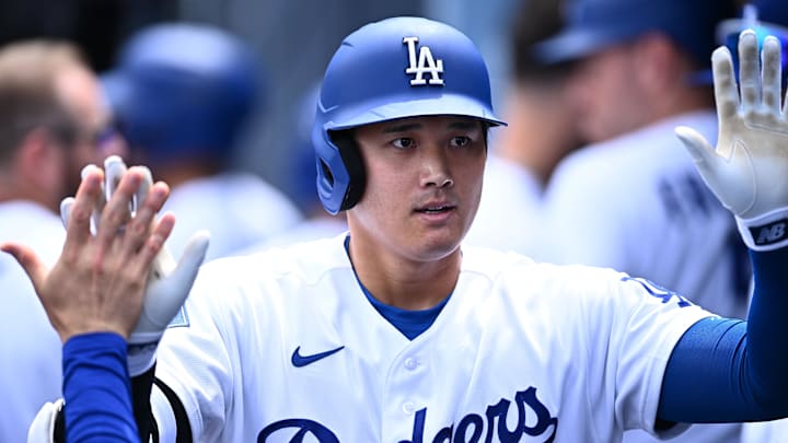 Apr 12, 2026; Los Angeles, California, USA;  Los Angeles Dodgers two-way player Shohei Ohtani (17) hits a solo homerun during the first inning against the Texas Rangers at Dodger Stadium. Mandatory Credit: Jonathan Hui-Imagn Images