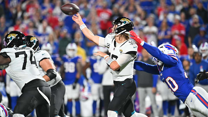 Sep 23, 2024; Orchard Park, New York, USA; Jacksonville Jaguars quarterback Trevor Lawrence (16) throws a pass under pressure by Buffalo Bills linebacker Von Miller (40) in the fourth quarter at Highmark Stadium. Mandatory Credit: Mark Konezny-Imagn Images Sep 23, 2024; Orchard Park, New York, USA; Jacksonville Jaguars quarterback Trevor Lawrence (16) throws a pass under pressure by Buffalo Bills linebacker Von Miller (40) in the fourth quarter at Highmark Stadium. Mandatory Credit: Mark Konezny-Imagn Images
