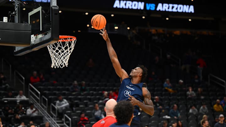 Arizona Wildcats center Emmanuel Stephen (34) shoots the ball during practice at Climate Pledge Arena. Arizona Wildcats center Emmanuel Stephen (34) shoots the ball during practice at Climate Pledge Arena.