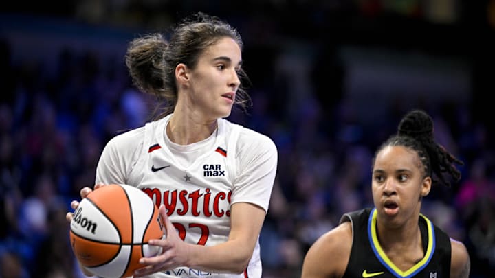 Jun 28, 2025; Arlington, Texas, USA; Washington Mystics guard Sonia Citron (22) grabs a rebound against the Dallas Wings during the second half at College Park Center. Mandatory Credit: Jerome Miron-Imagn Images